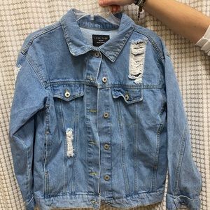Distressed denim jacket